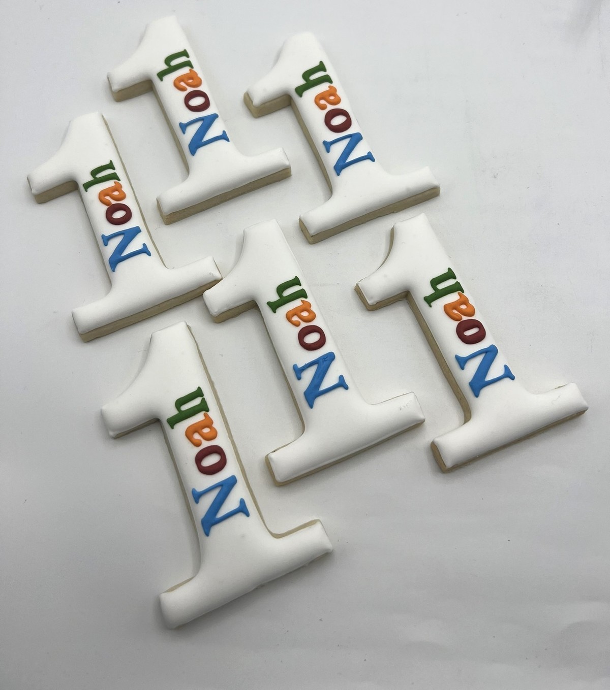 Custom hand-piped number one first birthday cookie San Francisco bakery